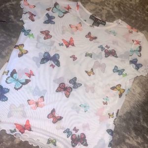 super cute newer mesh top with butterfly’s throughout